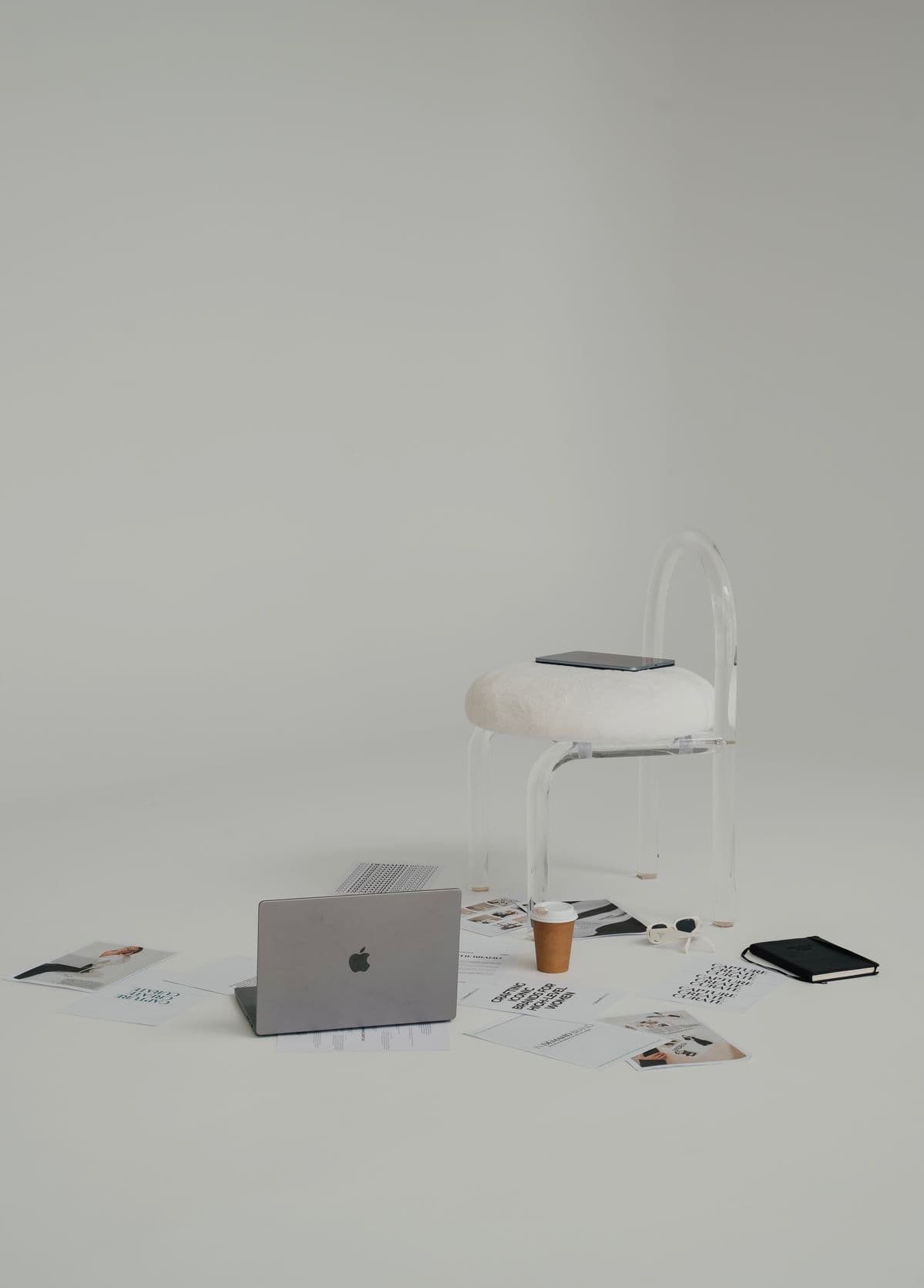 Creative workspace with brand materials and laptop